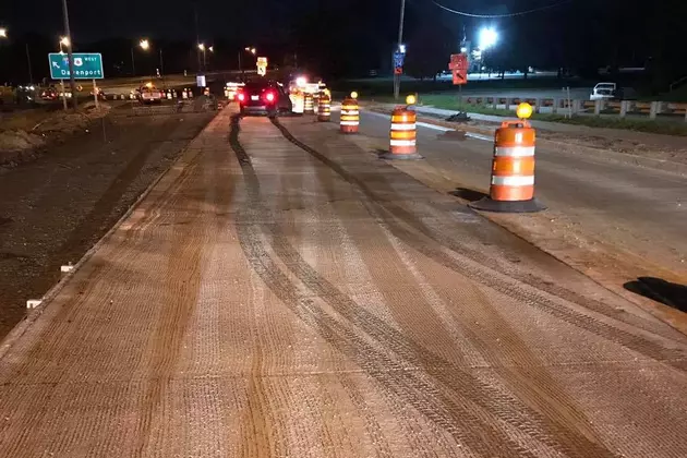 Driver Travels Through Wet Concrete on I-74