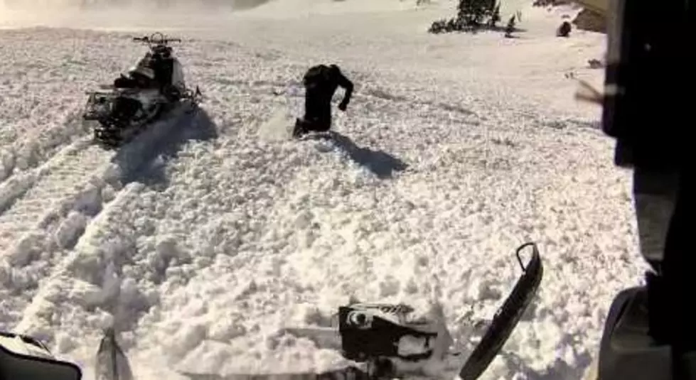 Dude on Snowmobile Gets Swallowed By Avalanche and Rescued by Friends [VIDEO]