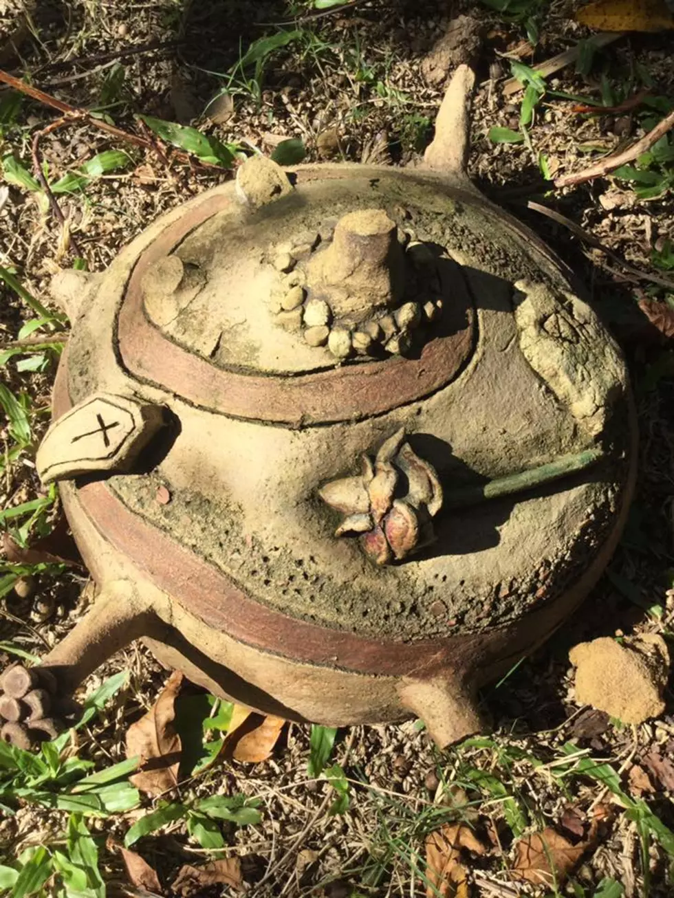 Weird, creepy pottery found in a woman's backyard. What is it?
