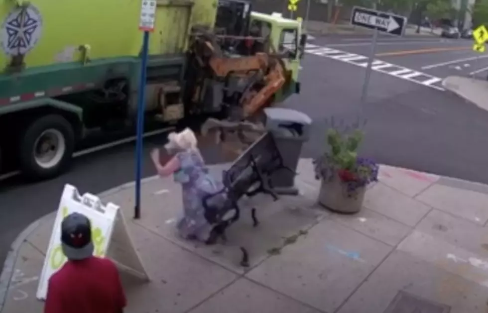 Wild Video Of A NY Woman Being Tossed By A Garbage Truck