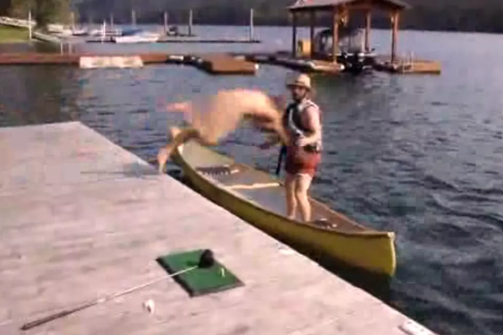 Really Mean Naked Guy Smashes His Unsuspecting Buddy Off a Canoe Into the River [VIDEO]