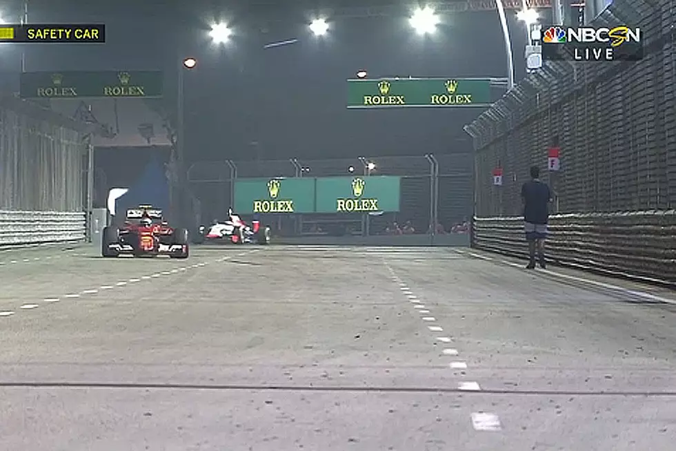 Fearless (And Crazy) Fan Walks Onto Track During Singapore Grand Prix