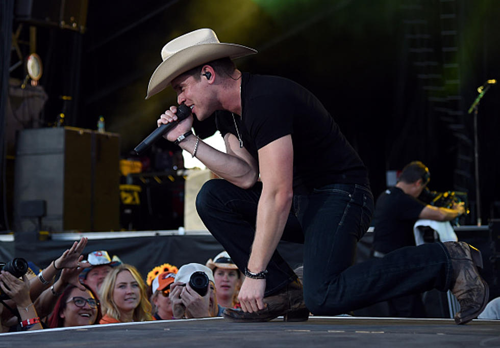 Dustin Lynch Gets Stitches After A Beer Can Is Thrown At Him While On Stage!