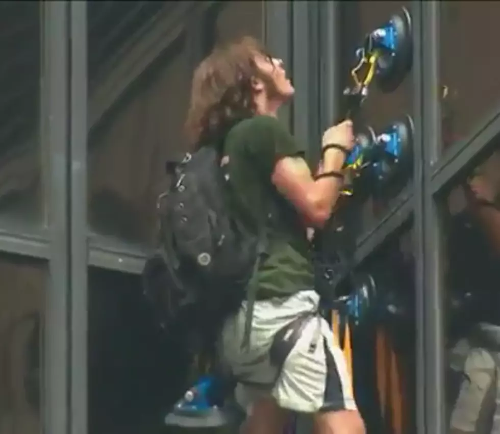 BREAKING: Man Climbing Trump Tower With Suction Cups