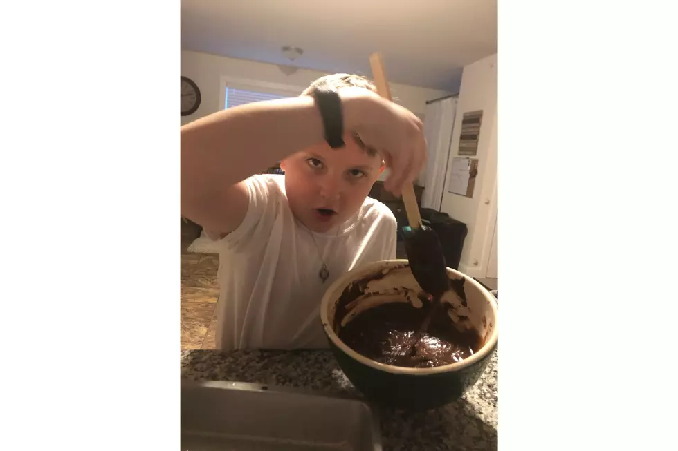 Chrissy Cheers on Family While Making Brownies