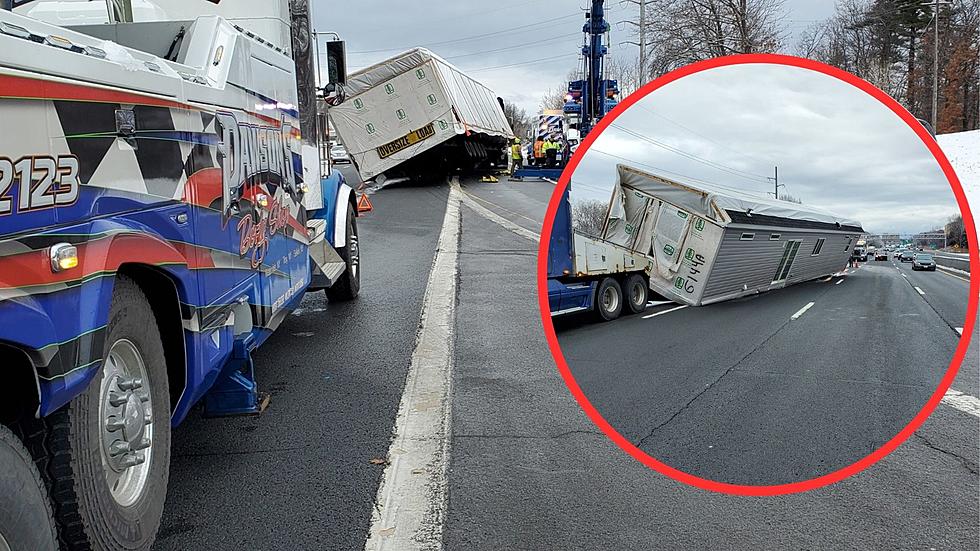 Load in the Road! Mod Home Falls Off Truck Onto Highway In Albany