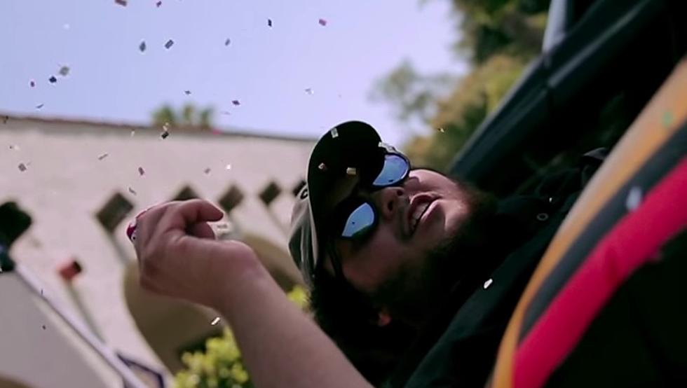 Alex Wiley Lounges by the Pool in “Heaven’s Gate” Video