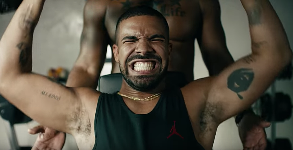 Drake Can’t Handle His Weights in New Apple Music Ad
