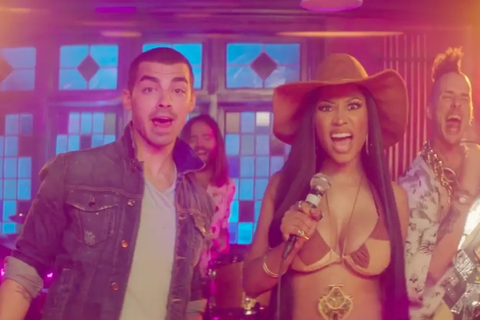 Nicki Minaj Rages With DNCE in “Kissing Strangers” Video
