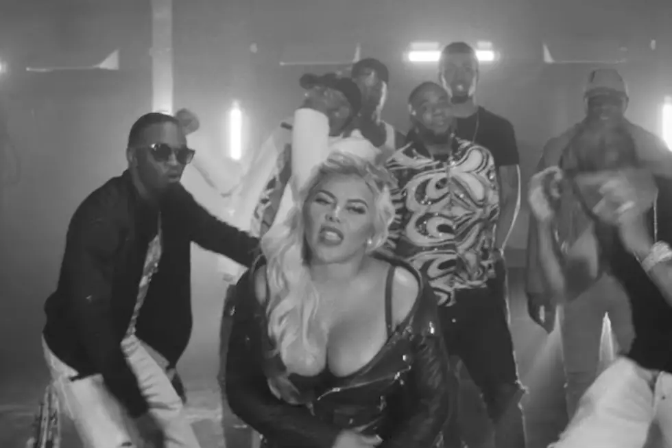 Lil' Kim Flexes in Black-and-White Video for ''Took Us a Break''