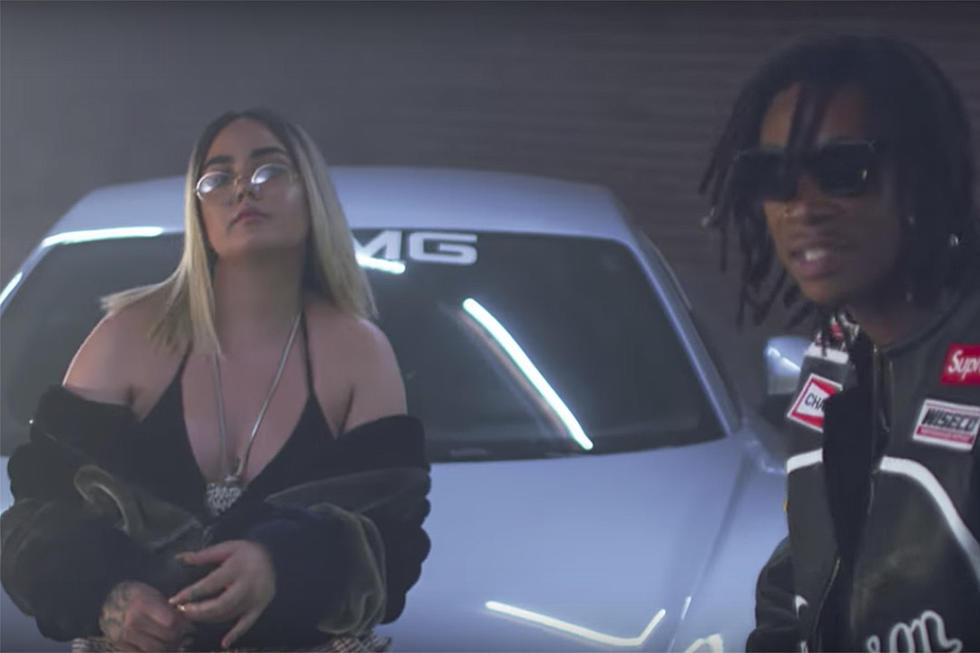 Wiz Khalifa Teams Up With Raven Felix for ''Job Done'' Video