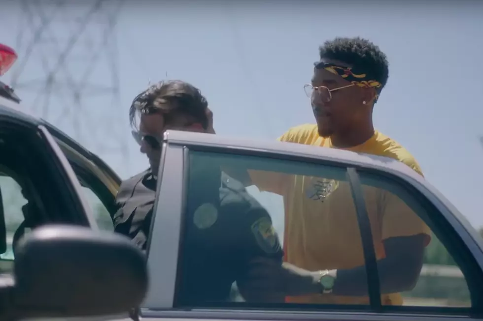 Cozz Plays Role Reversal With Cops in ''Questions'' Video