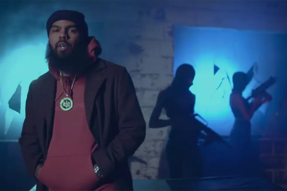 Stalley Is Surrounded by Armed Women in ''Turtle Van'' Video