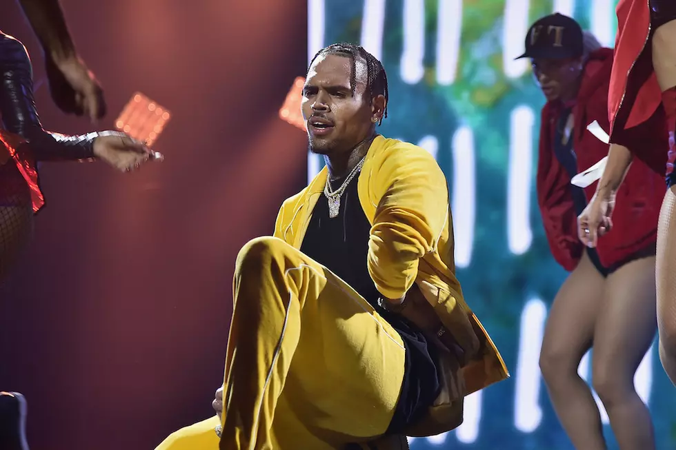 Chris Brown Caught on Camera Appearing to Choke a Woman, Both Claim Interaction Is Playful