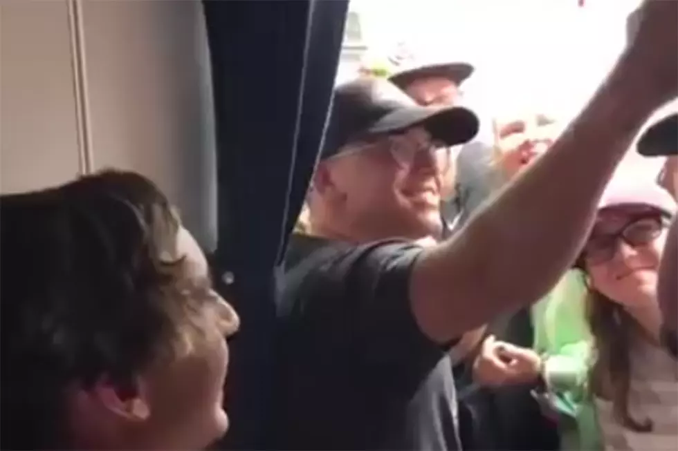 Logic Holds an Impromptu Meet and Greet With Fans on an Airplane