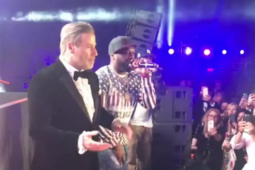 John Travolta Dances With 50 Cent at 2018 Cannes Film Festival
