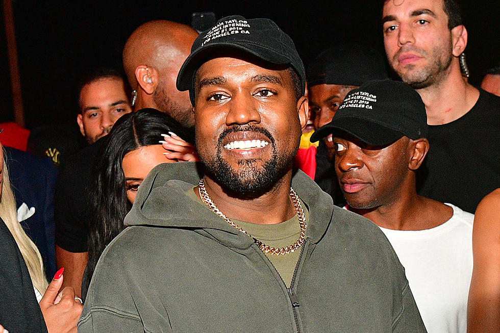 Kanye West Wears Massive Yeezy Slippers in Response to Haters