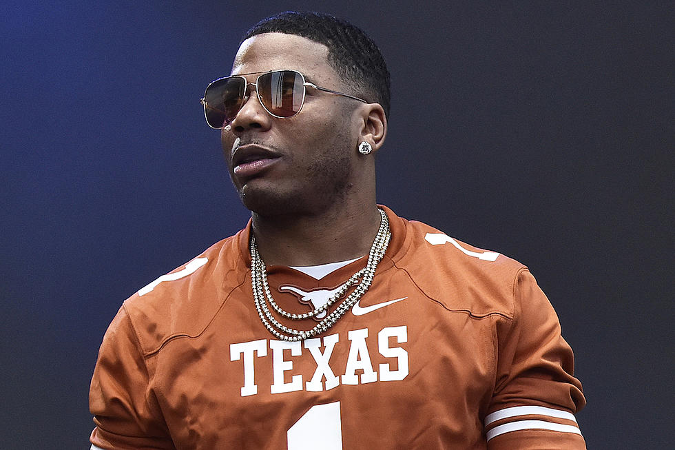 Nelly Stops Show After Fan Unties His Shoe: Watch