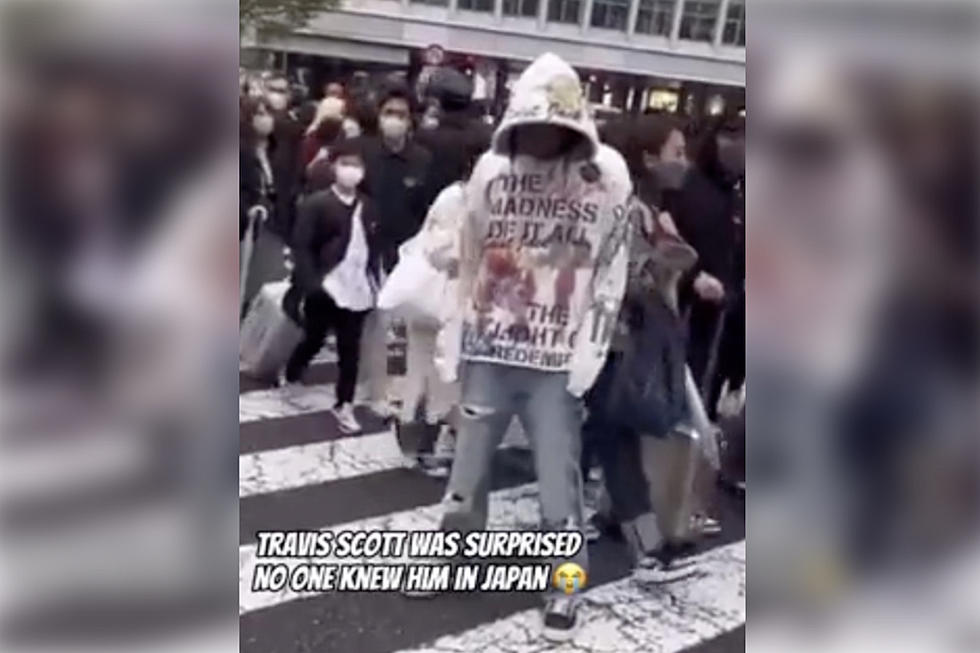 Travis Scott Stands in Crowd of Pedestrians in Japan, No One Recognizes Him – Watch