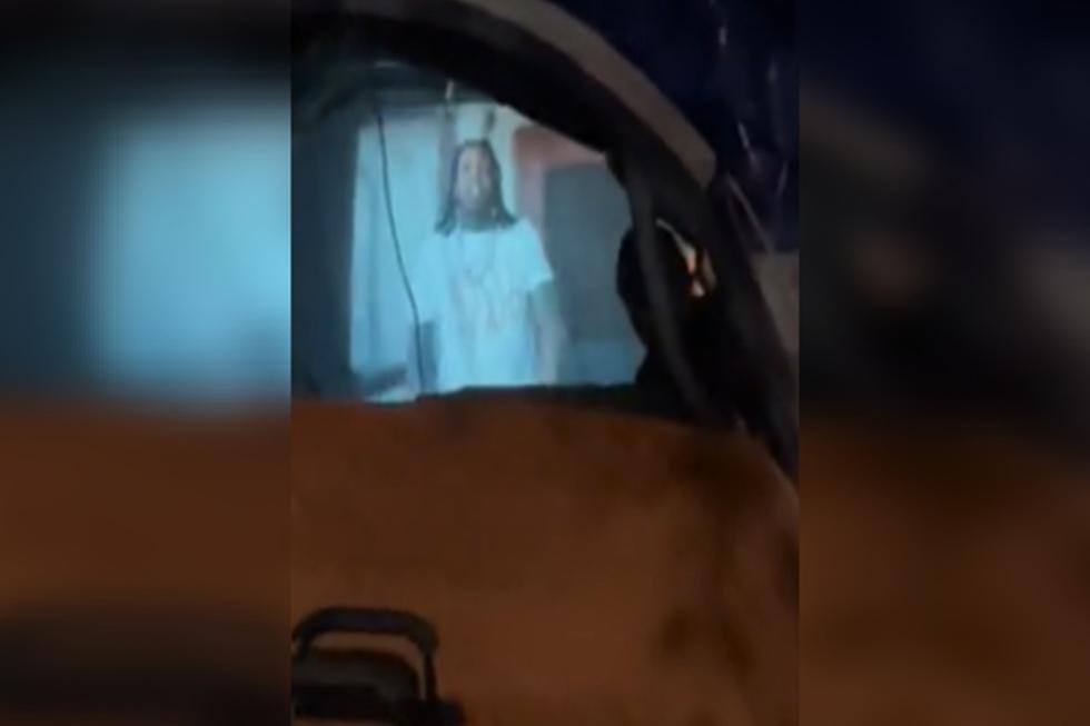 Homeless Person Spotted Watching Lil Durk and J. Cole’s ‘All My Life’ Video on Projector in Sidewalk Tent