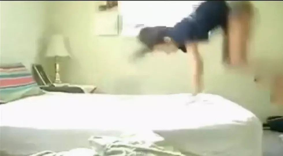 Girl Flips Off Bed And TV Lands On Her Head