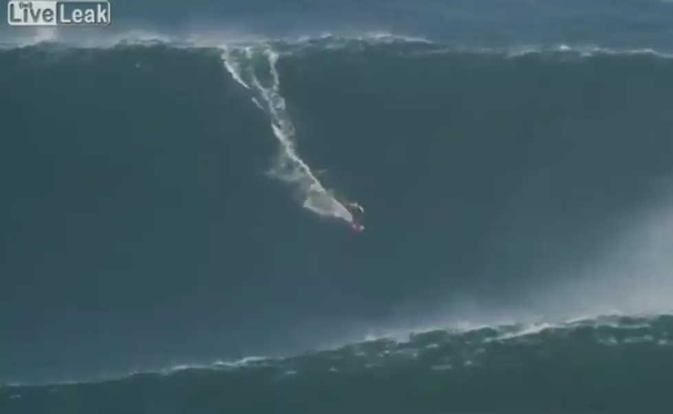 Surfer Rides Insane Wave
