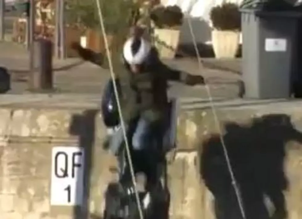 Motorcycle Journalist Rides Bike Off Dock [VIDEO]