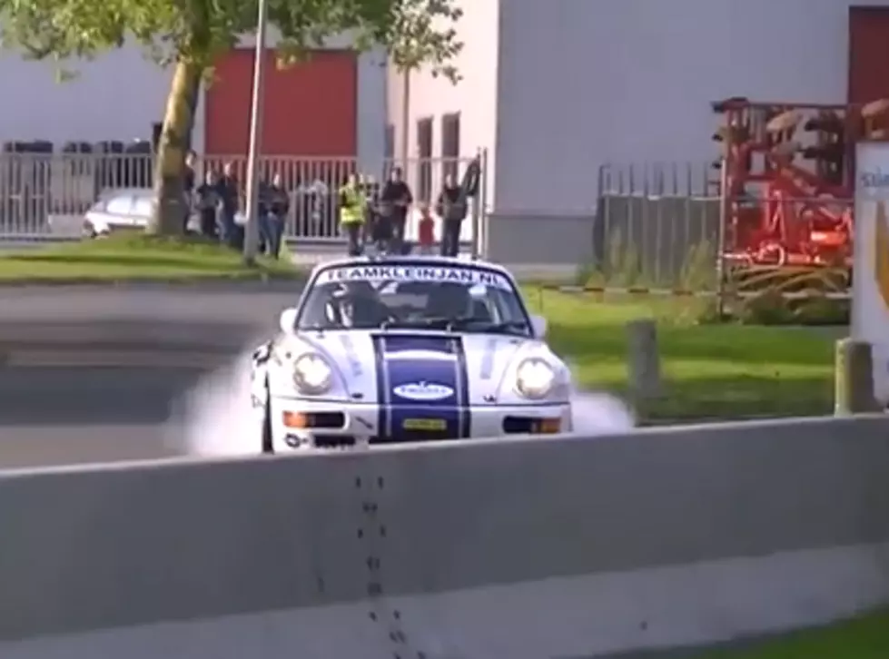 Race Car Driver Hits Head on Into Concrete Barrier [VIDEO]