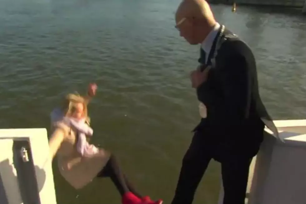 Reporter Falls Off Boat Into Water On Camera [VIDEO]