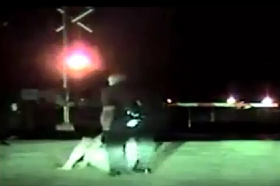 Heroic Cop Pulls Suicidal Woman From Train Tracks [VIDEO]