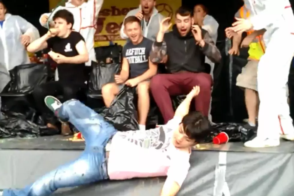 Iron Stomach Competitor Falls in Puke Covered Tarp [VIDEO]