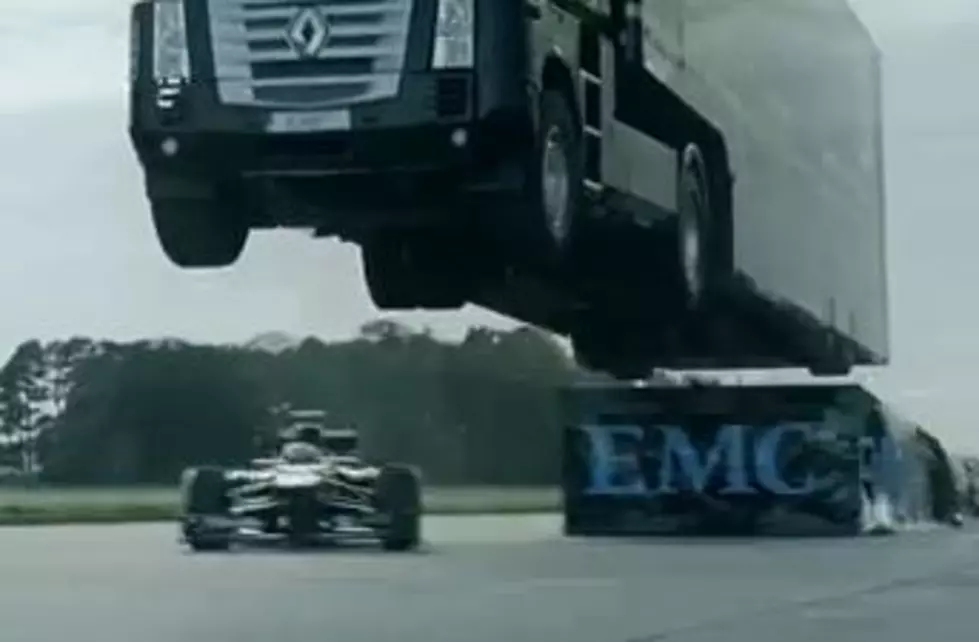 Semi-Truck Jumps Race Car [VIDEO]