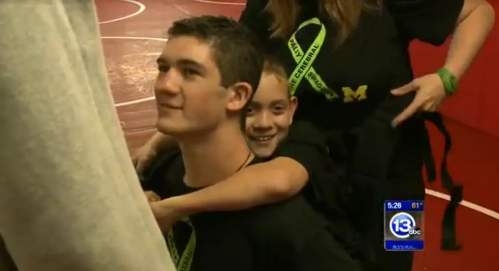 Teen Carrying Brother With Cerebral Palsy 111 Miles To Michigan State Capitol In Lansing [VIDEO]