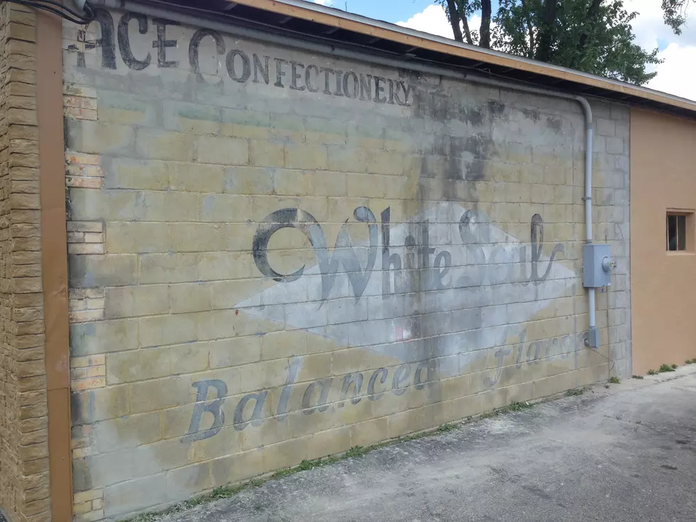 Man Uncovers Hand-Painted Flint Beer Mural on Building in Grand Blanc [VIDEO]