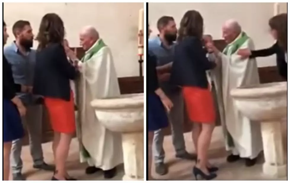 Priest Slaps Baby At Baptism [VIDEO]