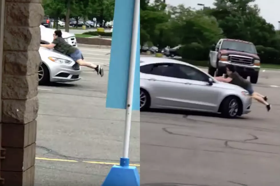 MI Woman Clings to Hood of Shoplifters Car [VIDEO]
