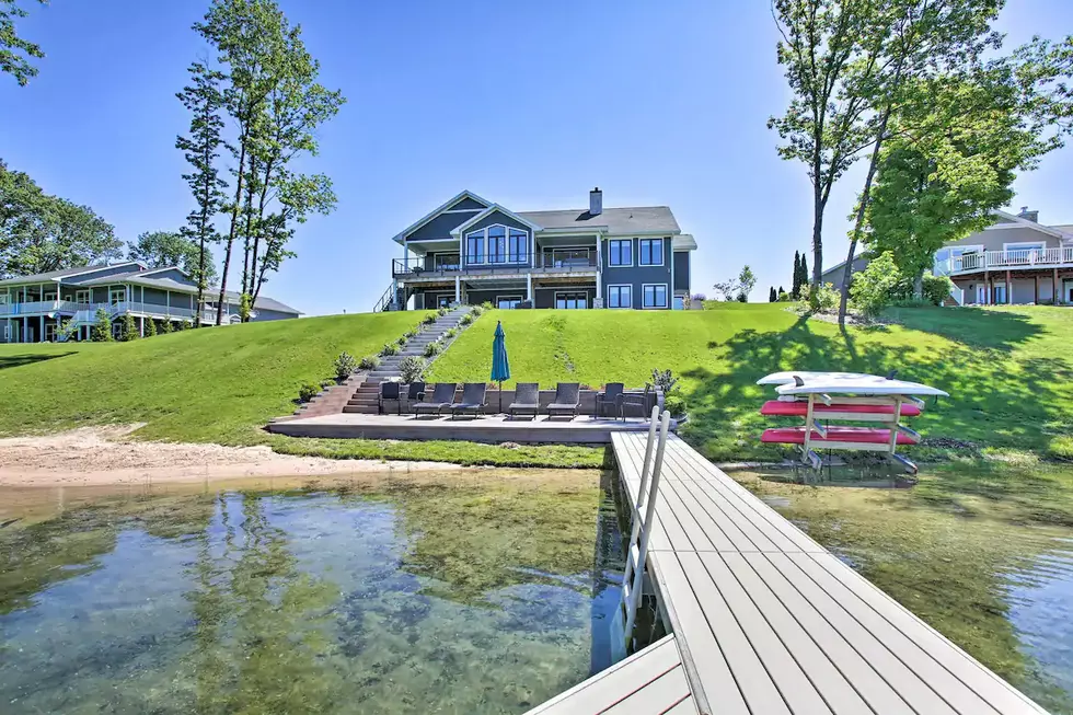 Huge Traverse City Airbnb Has 40' Dock, Beach, Kayaks, and More