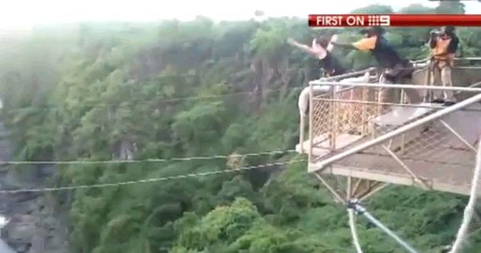 Woman’s Bungee Cord Snaps Over Croc-Infested River [Video]