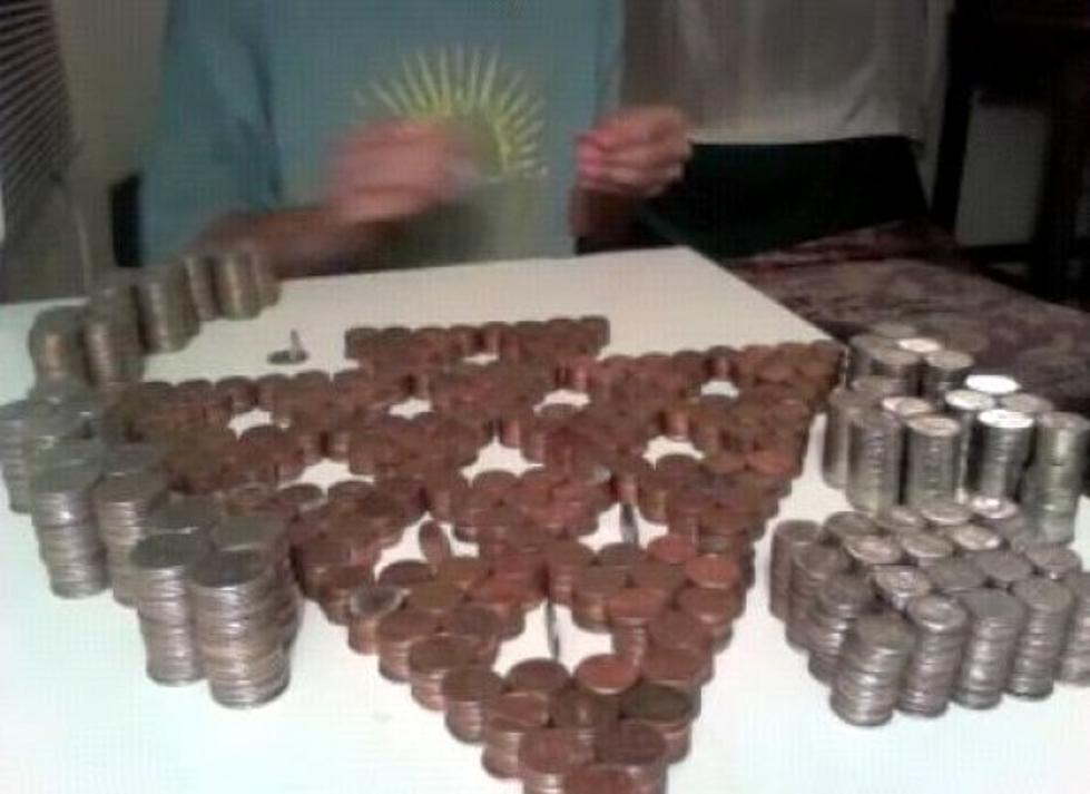 Balancing More Than 3,000 Coins On One Dime Is Easy [Video]