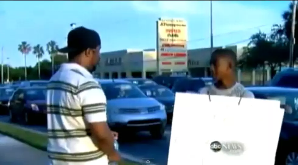Father Makes His Son Wear A Sign After Failing 3 Classes [Video]