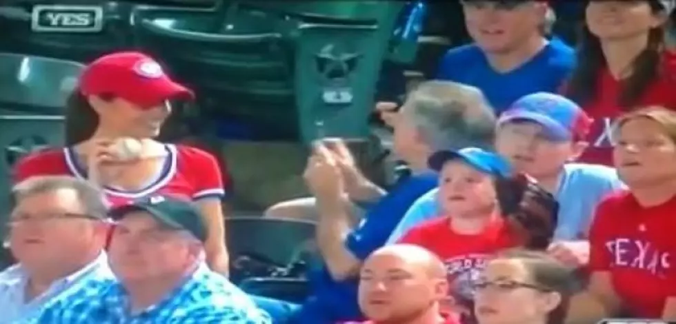 Woman Keeps A Ball From A Little Kid During A Rangers Game [Video]