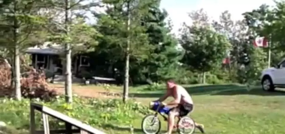 ATV Assisted Bike Jump Into A Pond Goes All Wrong [Video]