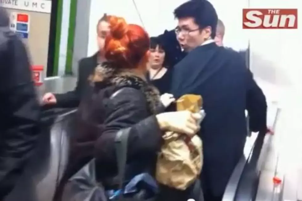 Drunk Businessman Walks Wrong Way on Escalator [VIDEO]
