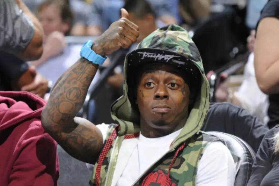Lil Wayne Dances On The American Flag [VIDEO]