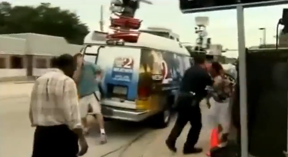 Woman Punches Reporter Only To Get Maced By The Police [Video]