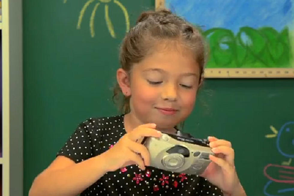 Watch Kids Try To Figure Out An Old School Camera [Video]