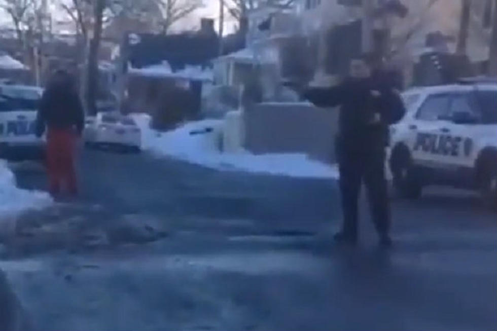 Policeman Pulls His Gun On A Group of Teens With Snowballs [Video]