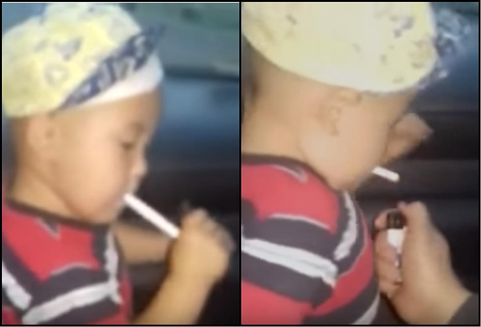 Mother Teaches 2-Year-Old How To Smoke A Cigarette [Video]