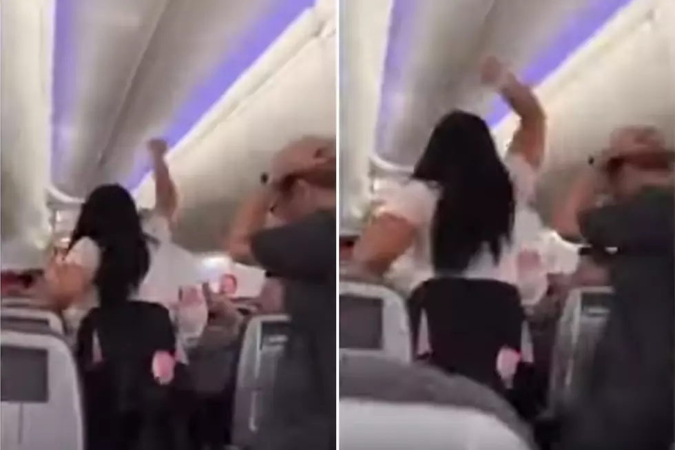 Woman Beats Boyfriend With Laptop For Looking at Other Women On Flight