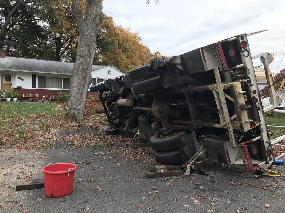 Worker Injured After Truck Rolls Over While Trimming Tree
